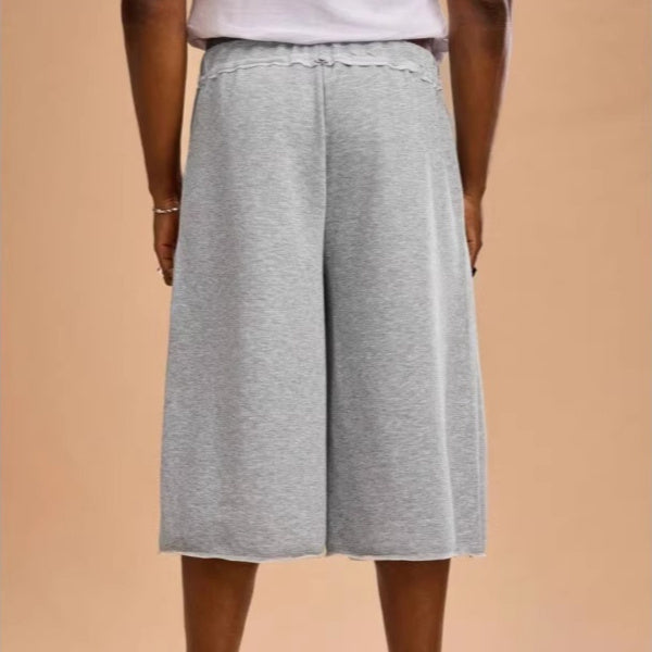 Gray loose-fit mid-length athletic shorts — main product photo