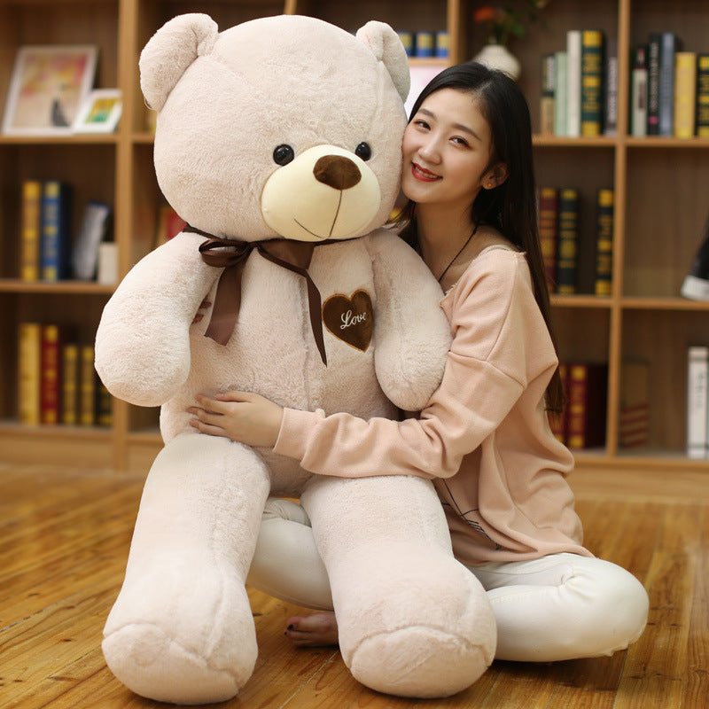 Soft plush teddy bear with ribbon — main product photo