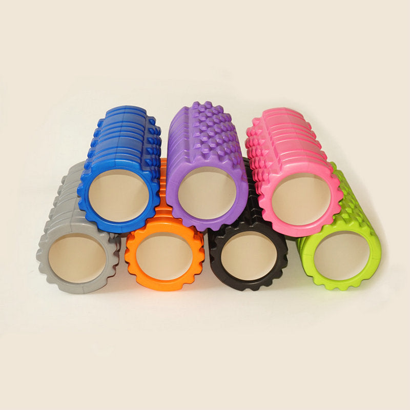 Yoga Foam Roller in various colors stacked together, designed for effective muscle relief and recovery.