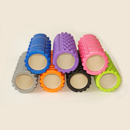 Yoga Foam Roller in various colors stacked together, designed for effective muscle relief and recovery.